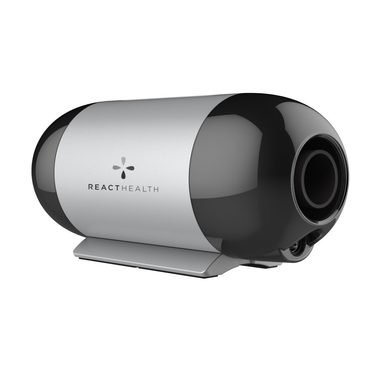 Angled View of React Health's Luna Travel CPAP Machine W/ AC Power Adapter