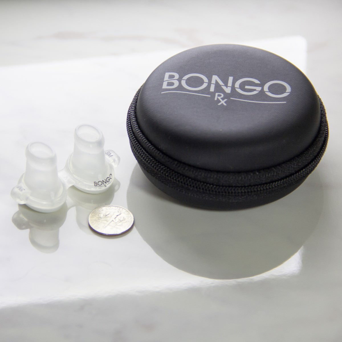 Overhead View of AirAvant's Bongo Rx Sleep Apnea Therapy Starter Kit W/ Travel Case & Quarter for Size Comparison