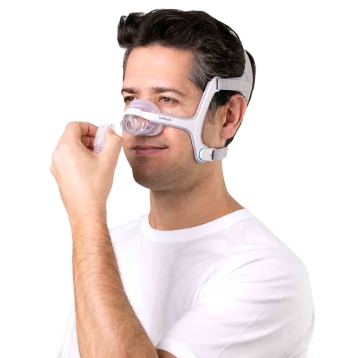 Photo of man wearing ResMed AirFit N20 CPAP mask with headgear