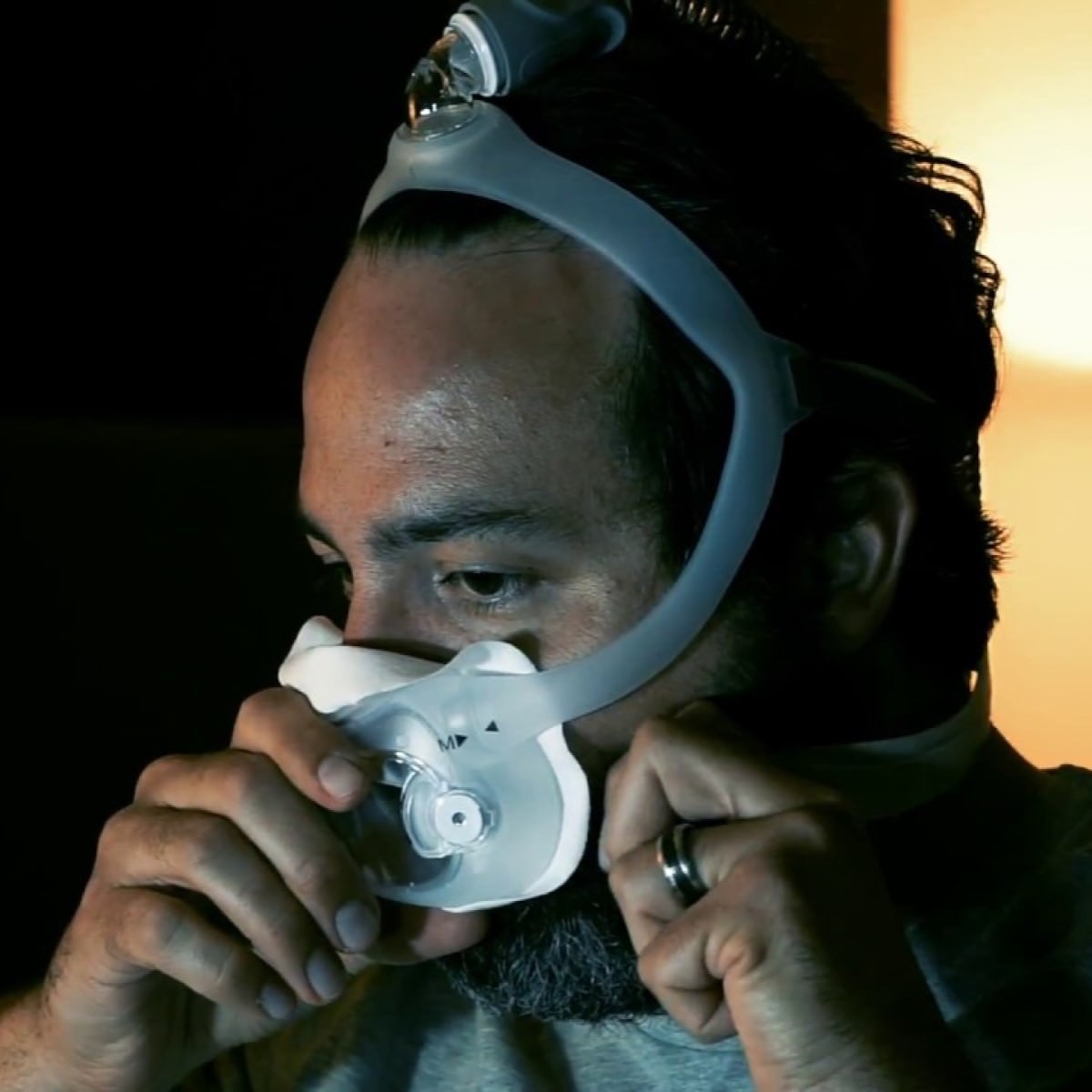 Photo of man wearing RemZzzs Amara View DreamWear full face CPAP mask liners