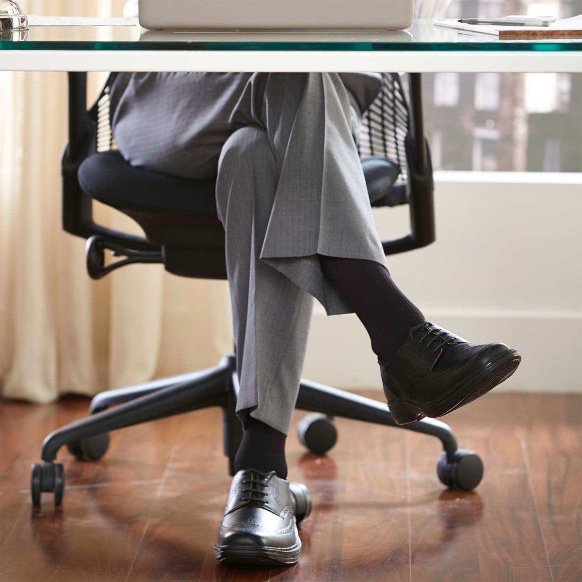 Photo of man wearing Ames Walker Style 200 Knee High Compression Socks under suit