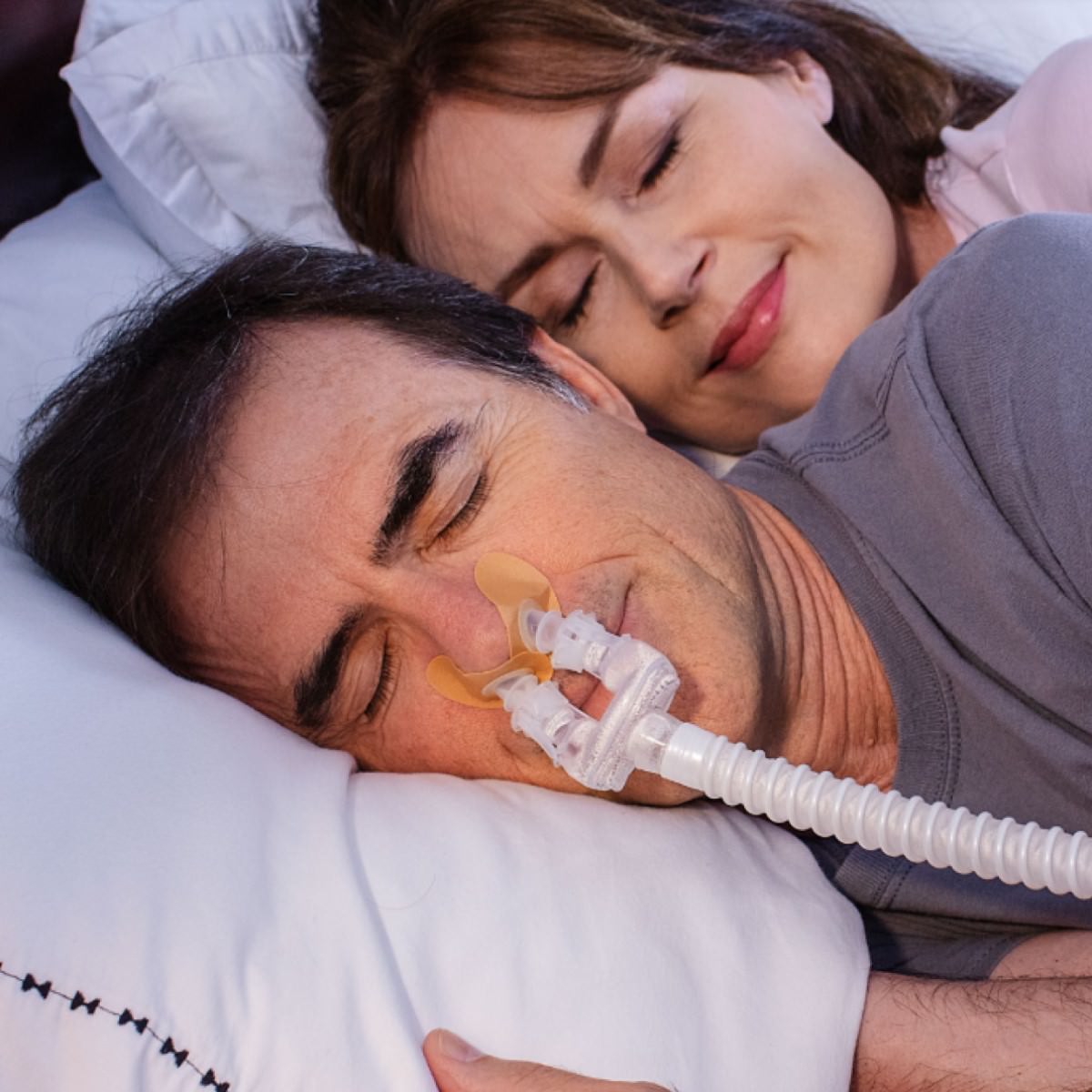 Photo of man using Bleep DreamPort Sleep Solution CPAP Interface Starter Kit