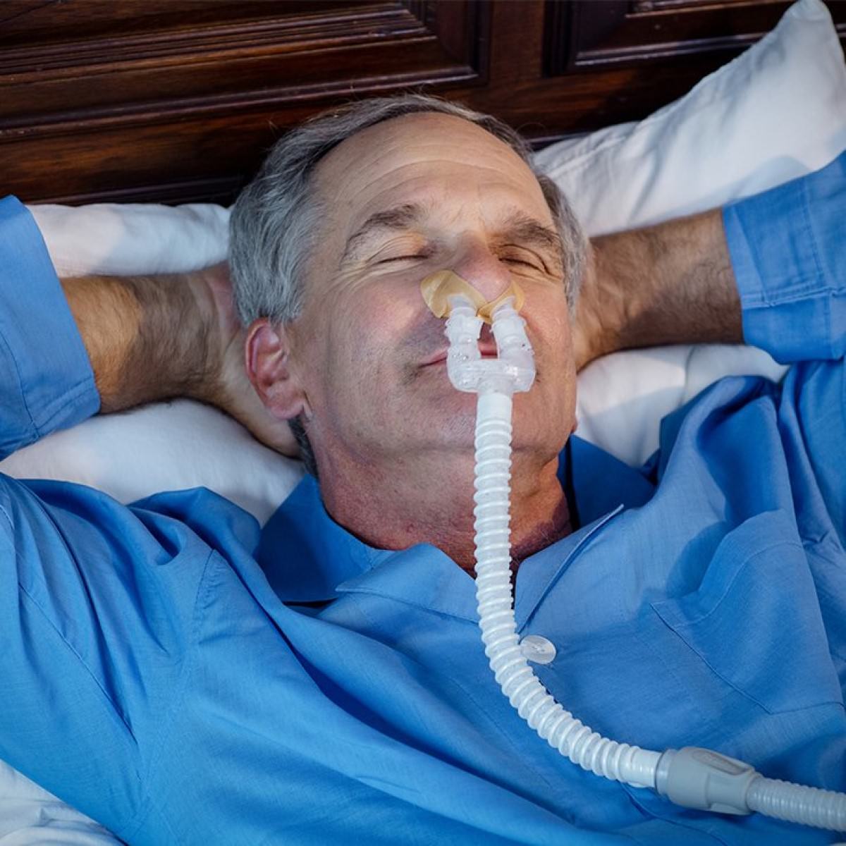 Photo of man using Bleep DreamPort Sleep Solution CPAP Interface Starter Kit