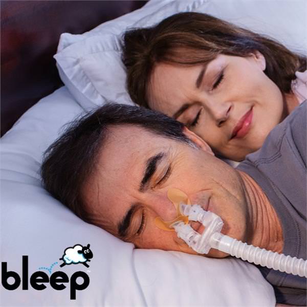 Photo of man using Bleep DreamPort Sleep Solution Interface Kit