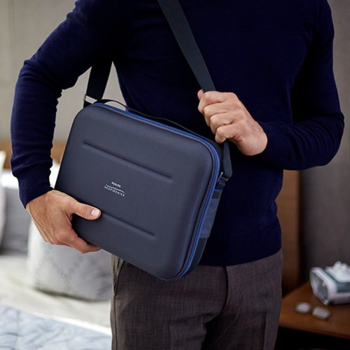Photo of man wearing Philips Respironics DreamStation CPAP Machine Travel Kit