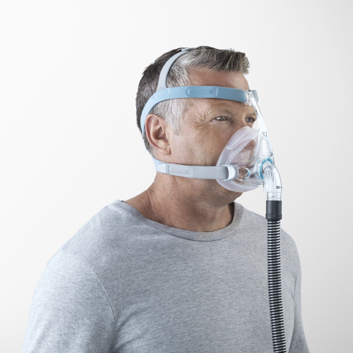 Stock Image of Man Wearing His Fisher & Paykel Vitera Full Face CPAP Mask W/ Headgear