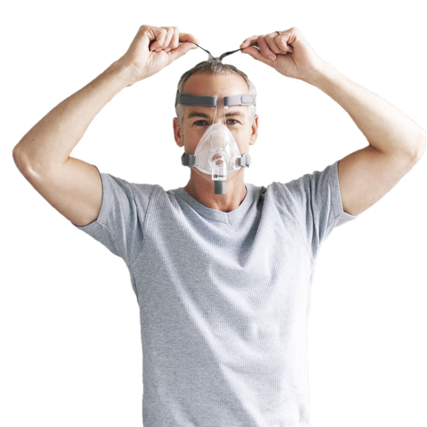 Stock photo of man wearing Fisher & Paykel Simplus full face CPAP mask with headgear