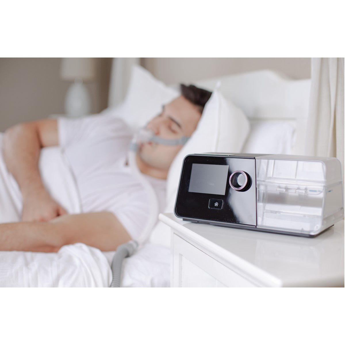Person Laying Supine Using Their 3B Medical Luna G3 Auto CPAP Machine