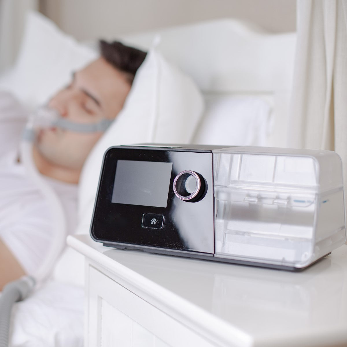 Person Laying Supine Using Their 3B Medical Luna G3 Auto CPAP Machine