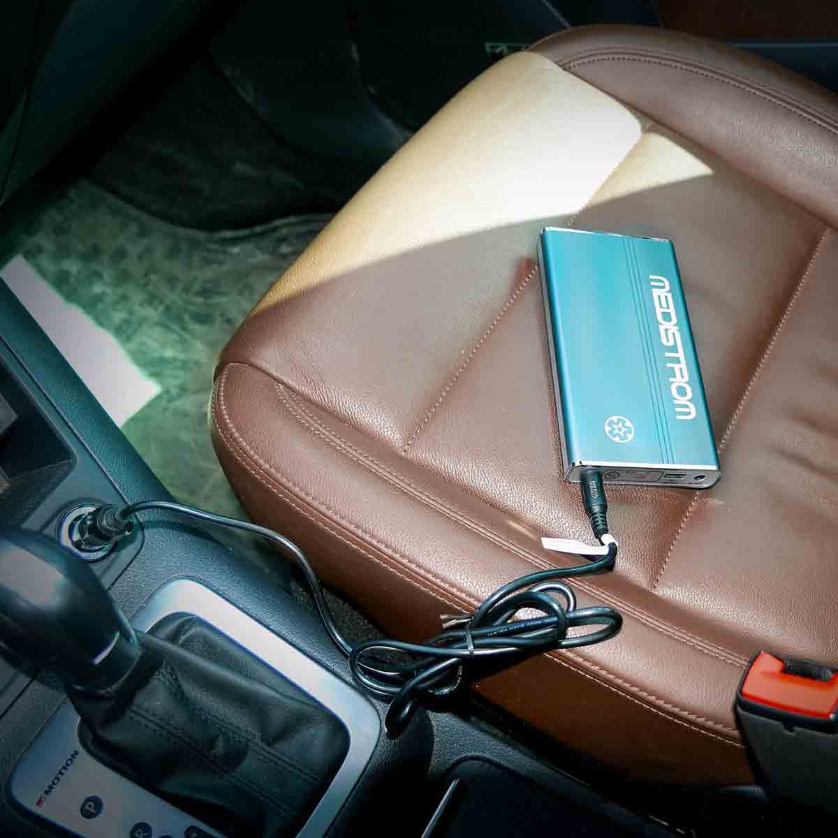 Photo of Choice One Medical Medistrom Pilot 12 CPAP battery car charger in a car seat