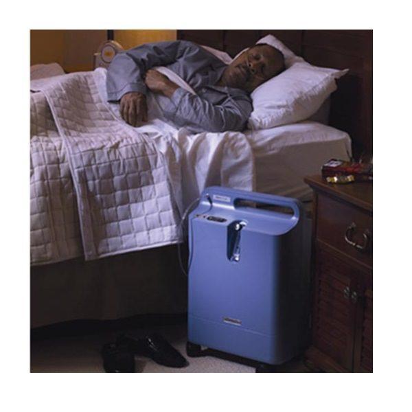 Photo of a man using Philips Respironics EverFlo Q Oxygen Concentrator
