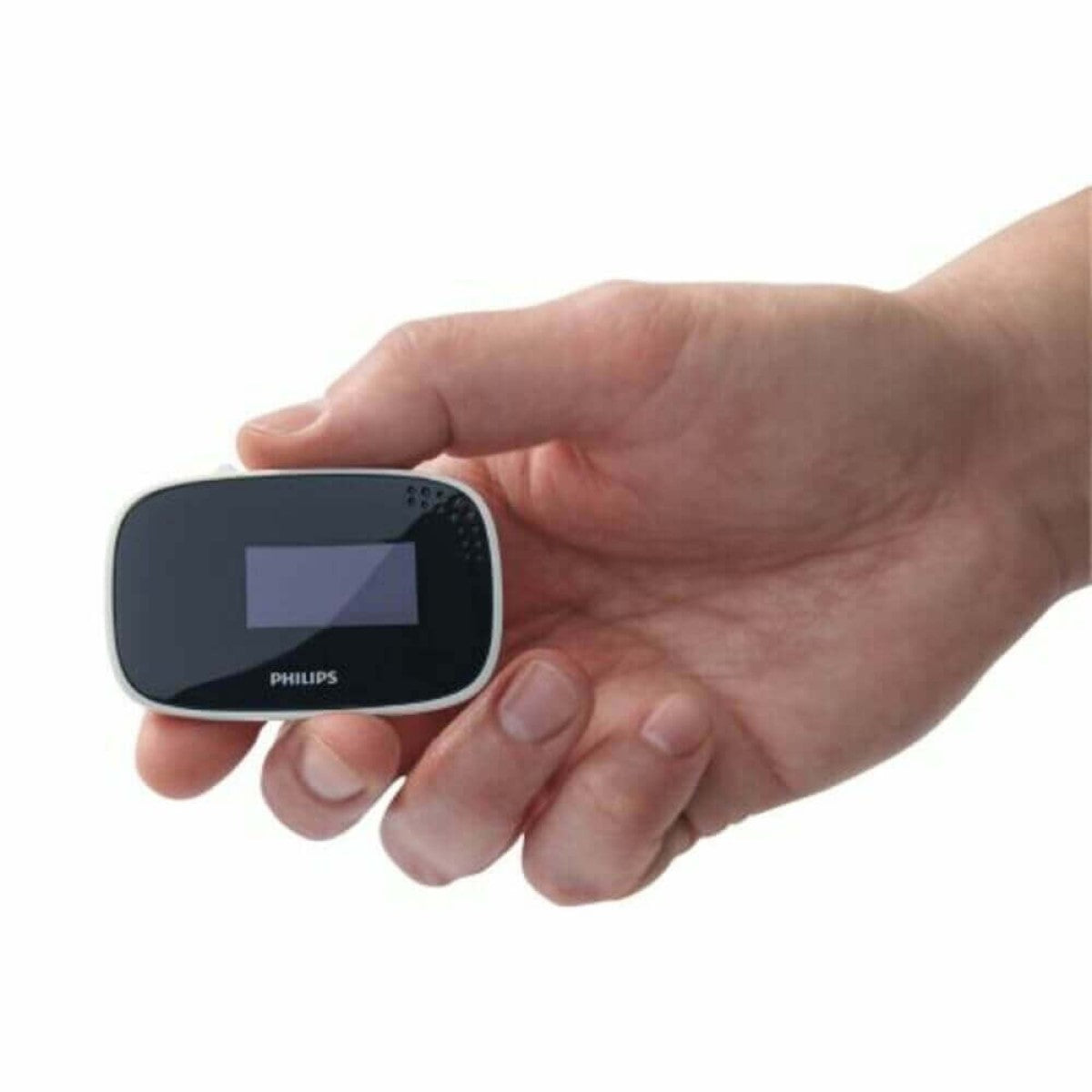 Stock photo of a hand holding Philips Respironics NightBalance Positional Sleep Therapy Device
