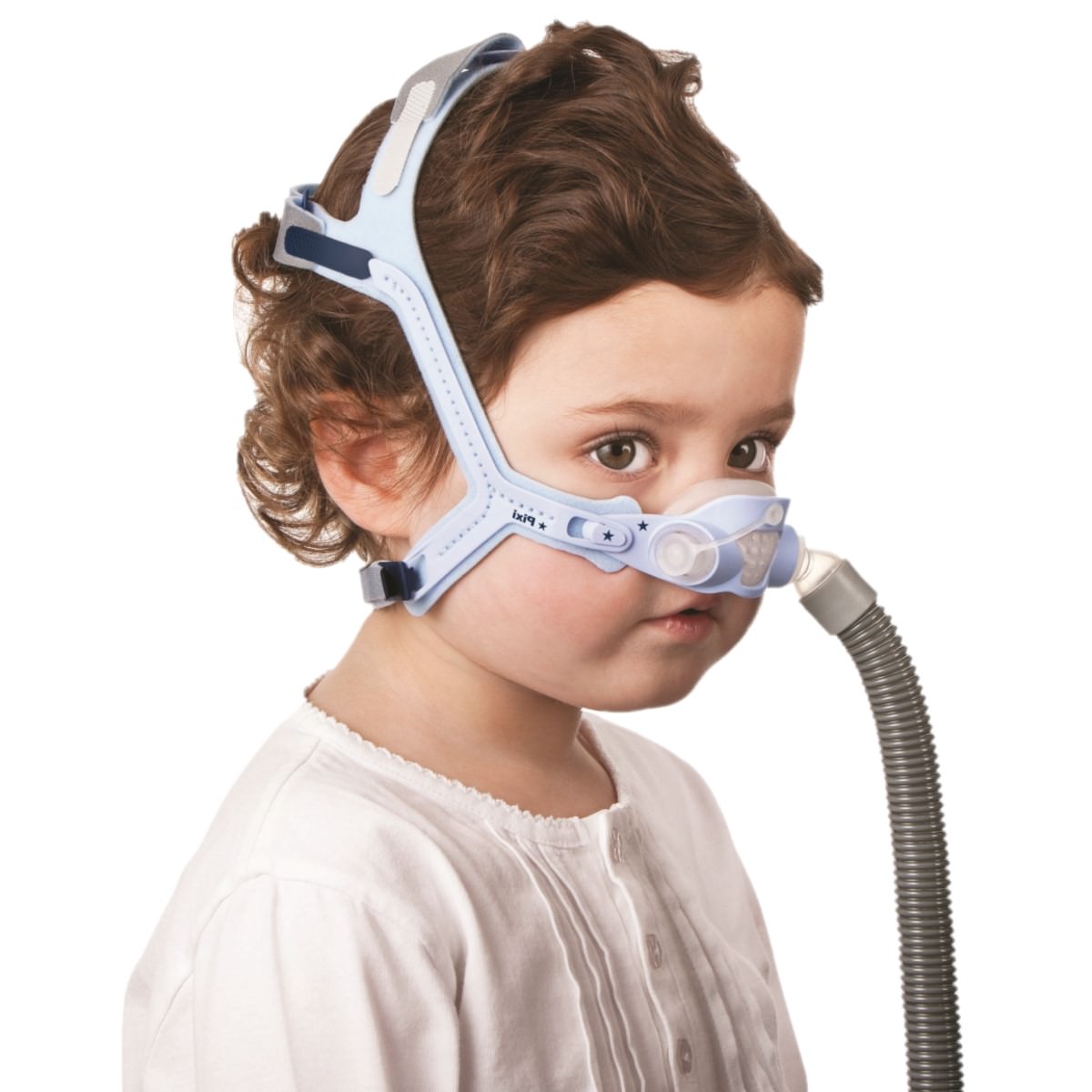Stock photo of boy wearing ResMed Pixi Pediatric nasal CPAP mask with headgear