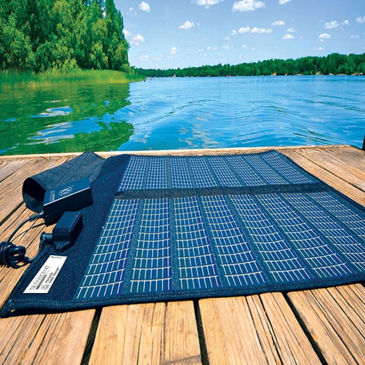 Photo of Somnetics Solar Battery Charger for Transcend CPAP Battery outside on a fishing dock