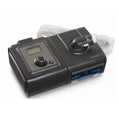 Stock photo of Philips Respironics System One 60 Series CPAP machine with heated humidifier and tubing