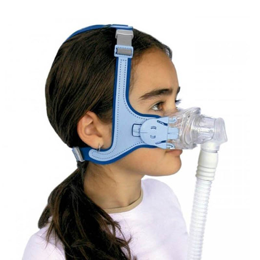Stock photo of girl wearing ResMed Mirage Kidsta CPAP mask made for kids