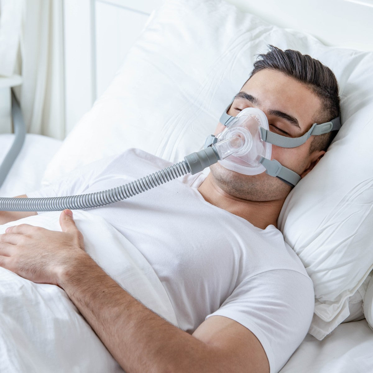Man Sleeping Wearing React Health's Siesta Full Face CPAP Mask W/ Headgear