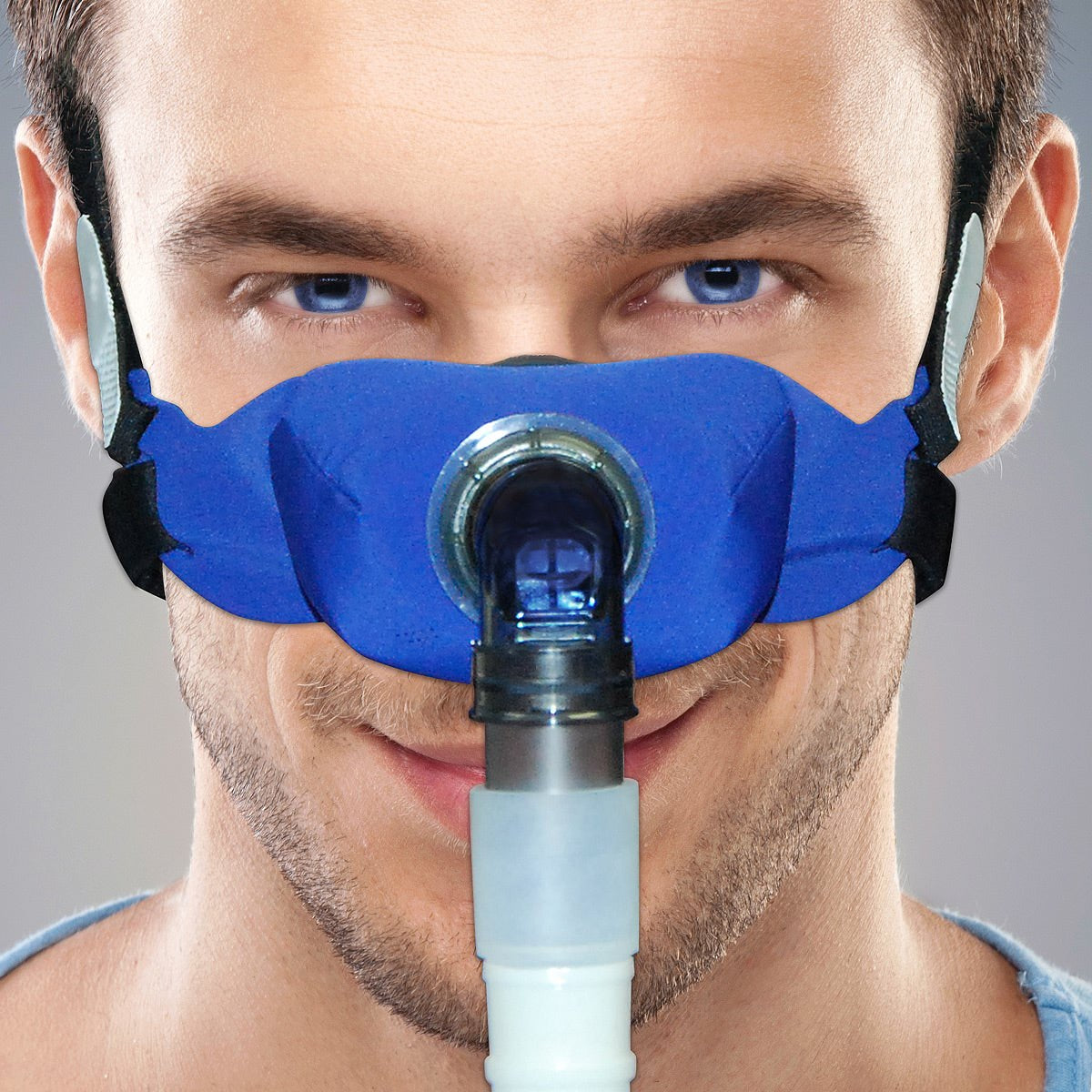 Stock Image of Man Wearing SleepWeaver Elan Cloth Nasal Mask W/ Headgear