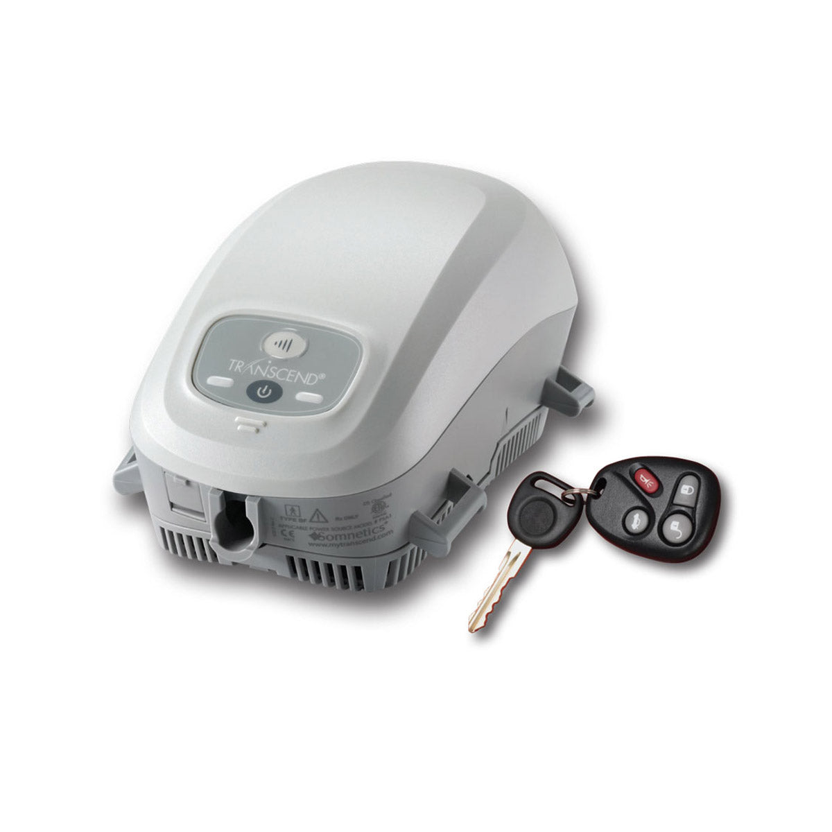 Stock photo of Somnetics Transcend Mini Auto CPAP With EZEX CPAP machine next to keys
