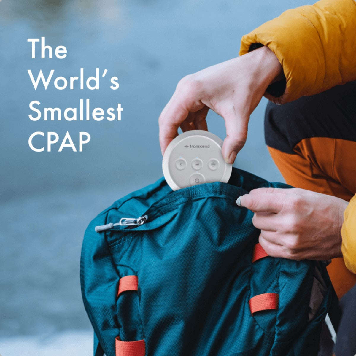 Photo of a hand pulling a certified refurbished Transcend Micro Auto Travel CPAP machine out of a backpack