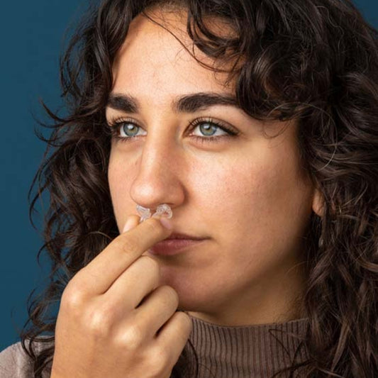 Photo of Woman using Mute anti-snoring Dilator