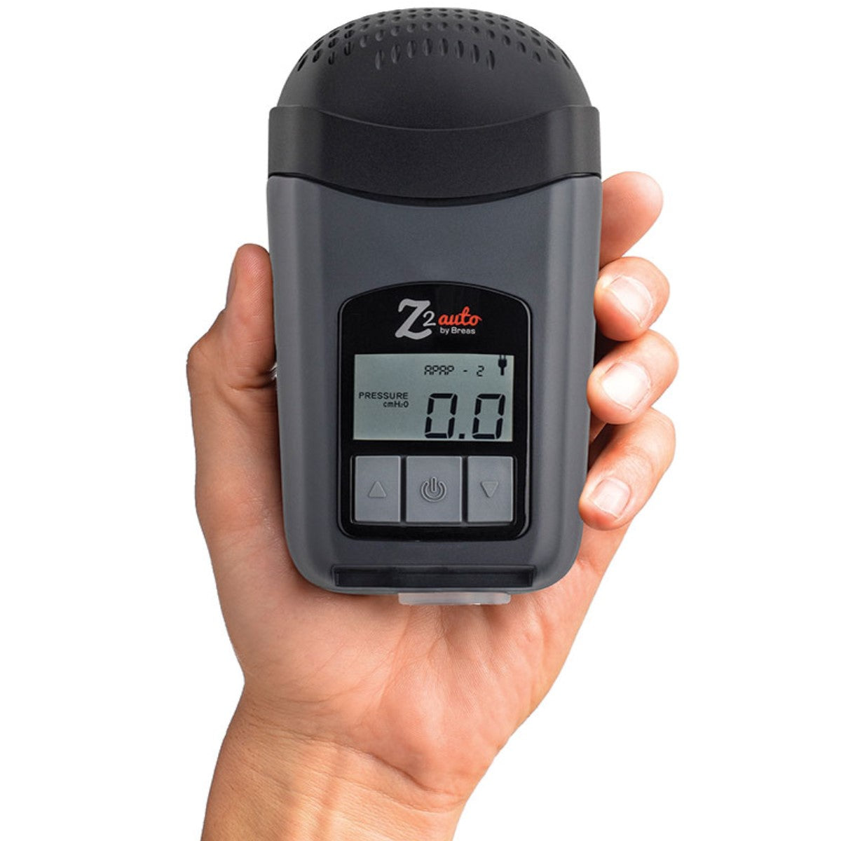 Stock photo of hand holding a Breas Z2 Auto travel CPAP machine with Z-Breathe