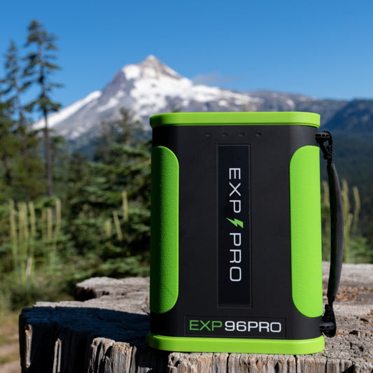 EXP 96 Pro Lithium Ion Battery W/ Mountain & Forest as Backdrop