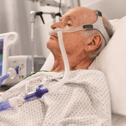 Patient Wearing Philips Respironics High Flow Nasal Cannula 
