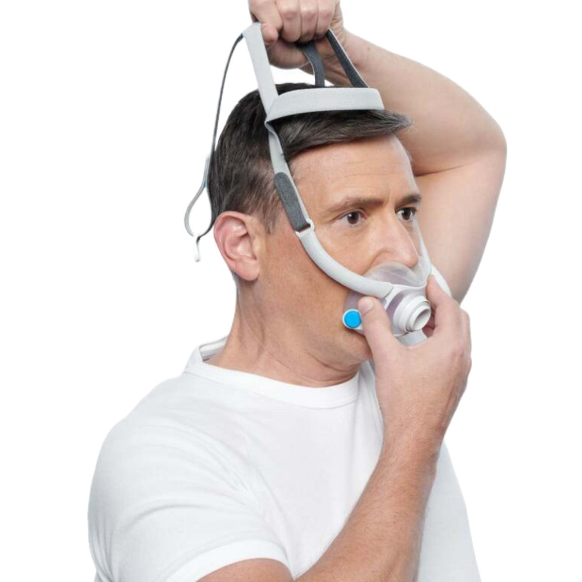 Man Fitting Himself W/ ResMed's AirFit F40 Full Face CPAP Mask W/ Headgear 
