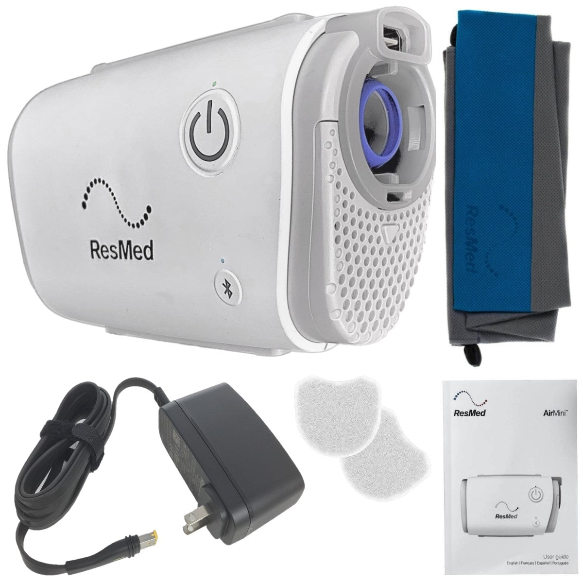 Stock photo of ResMed AirMini AutoSet travel CPAP machine, machine bag, power cord, manual, and filters