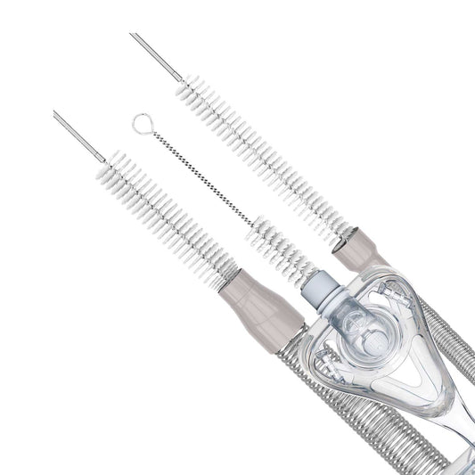 Stock photo of CPAPhero CPAP mask tube cleaning brush inside CPAP mask and tubing