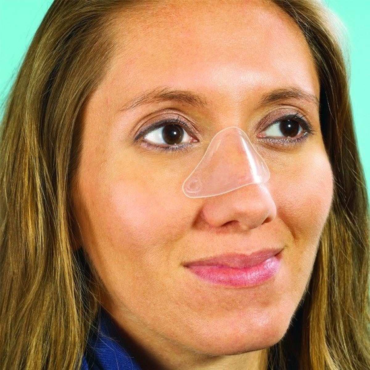 Photo of woman wearing Philips Respironics LiquiCell nasal CPAP cushion 15 pack