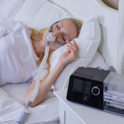Woman Sleeping W/ Her React Health Luna G3 CPAP Machine 
