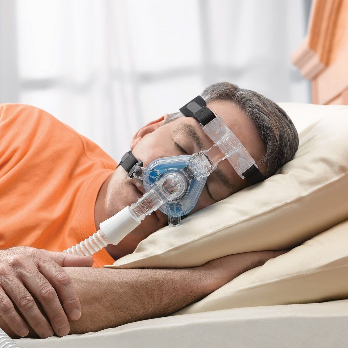 Man Sleeping Using Philips Respironics Original ComfortGel Nasal CPAP Mask