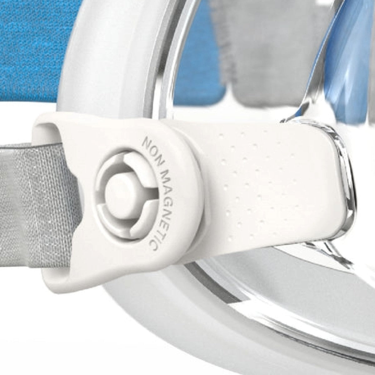 Close-up of a white strap with a 'Non-Magnetic' label on a blue background