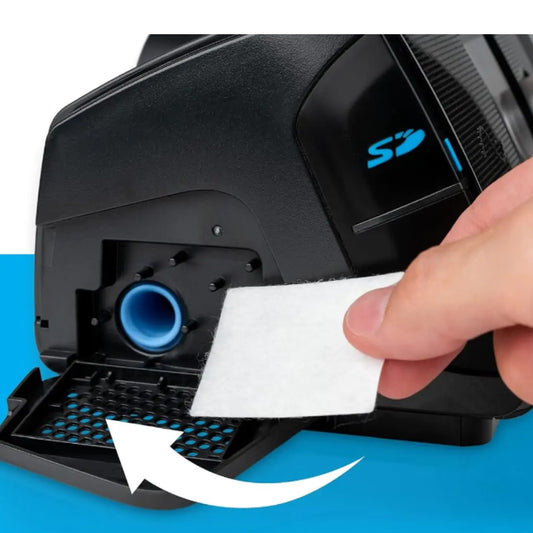 Stock photo of putting ResMed Hypo-Allergenic filters for AirSense CPAP or AirCurve VPAP into machine