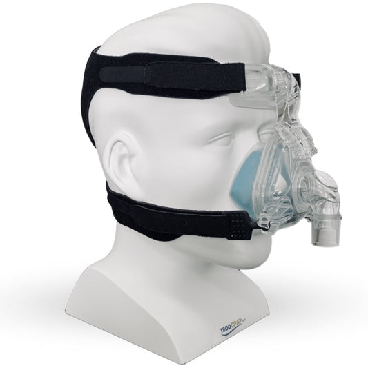 Angled View of Philips Respironics ComfortGel Blue Nasal CPAP Mask W/ Headgear on Mannequin Head