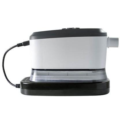 Stock photo of Somnetics Transcend 365 miniCPAP P10 Battery plugged into Transcend machine