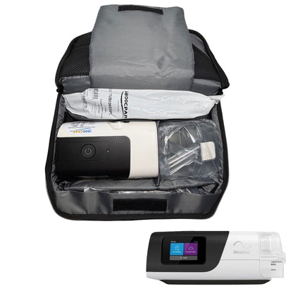 ResMed CPAP bag with medical supplies and a portable device on a white background