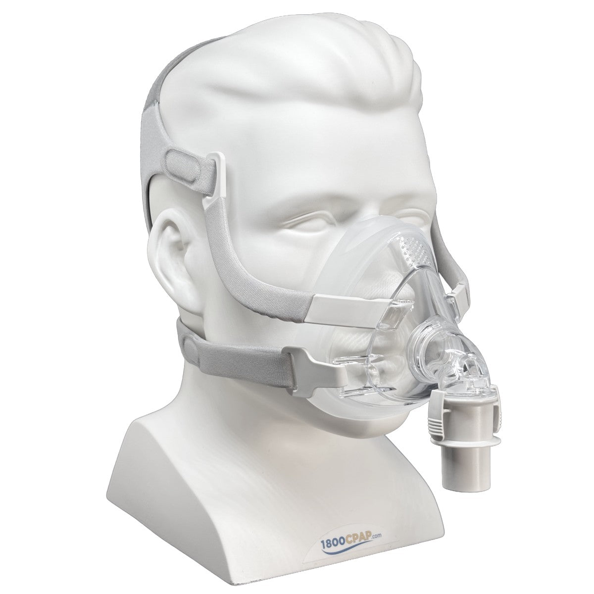 A clear CPAP mask with gray straps displayed on a white mannequin head and neck stand against a white background. The stand has the 1800CAP brand logo printed near the bottom.